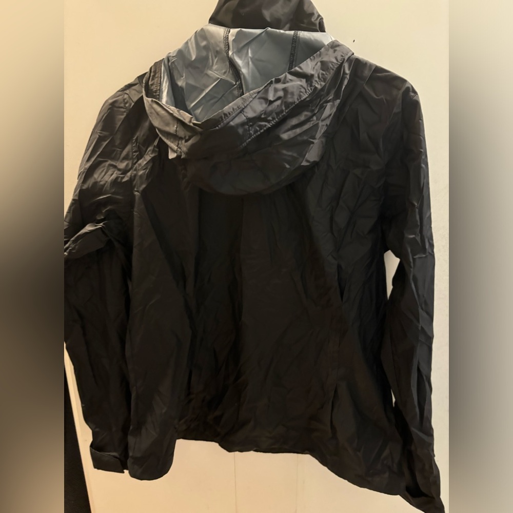 New with tag Columbia women’s rain jacket, black size large